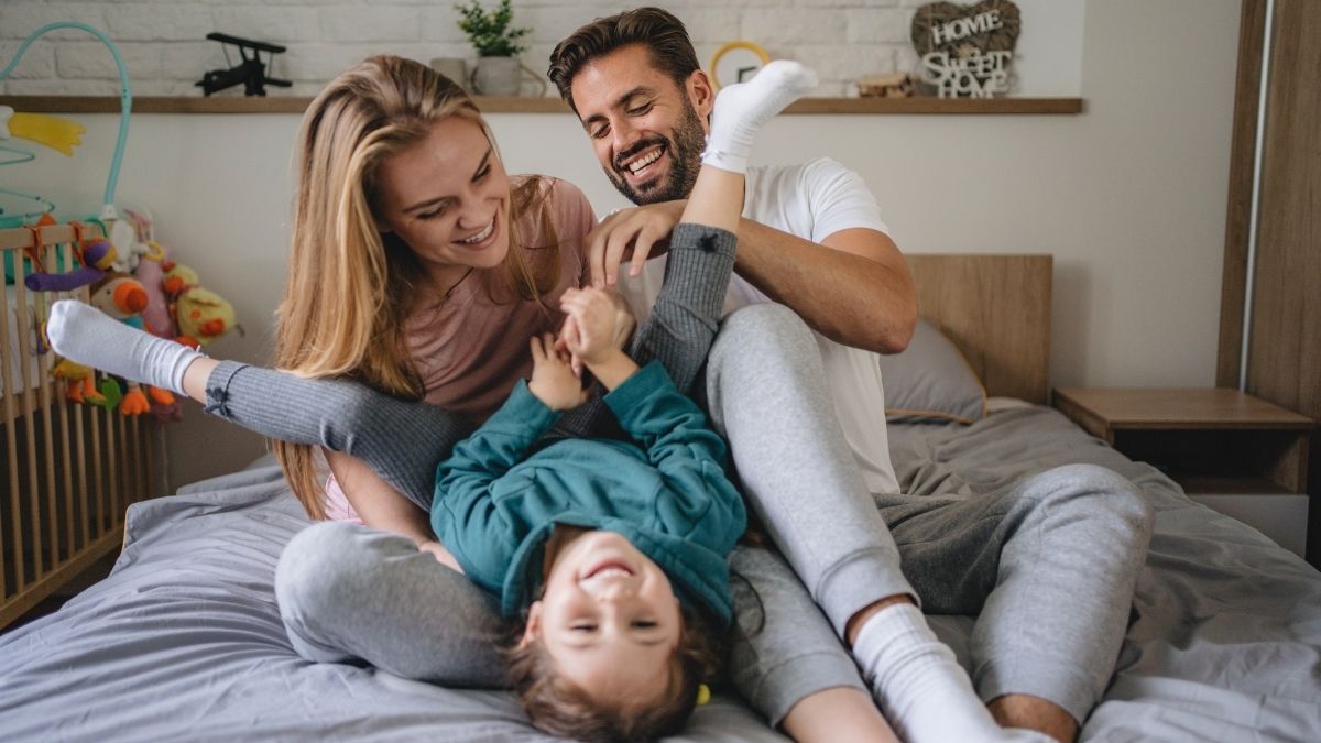 Family playing together at home, representing protecting your home and loved ones with mortgage protection in Ireland